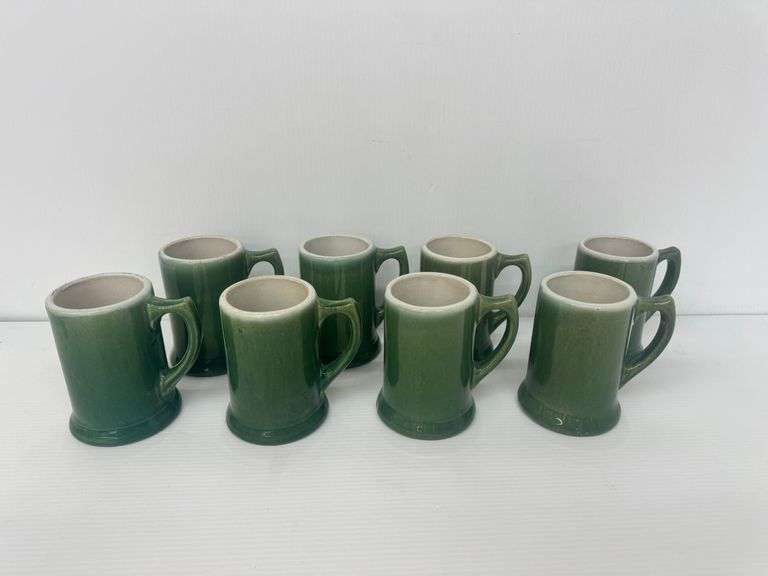 Set of Eight Green Glazed Ceramic Mugs image