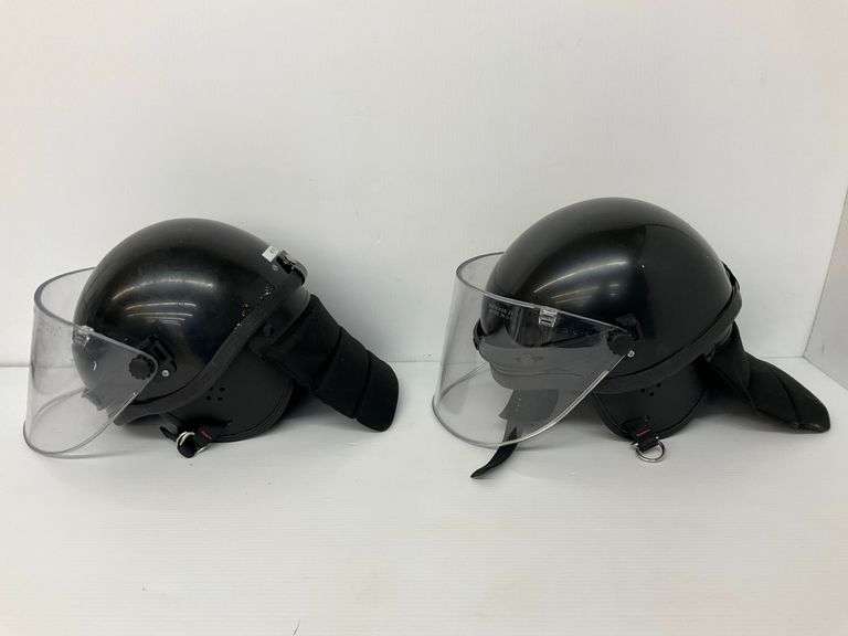 Two Riot Control Helmets with Face Shields... one has crack image