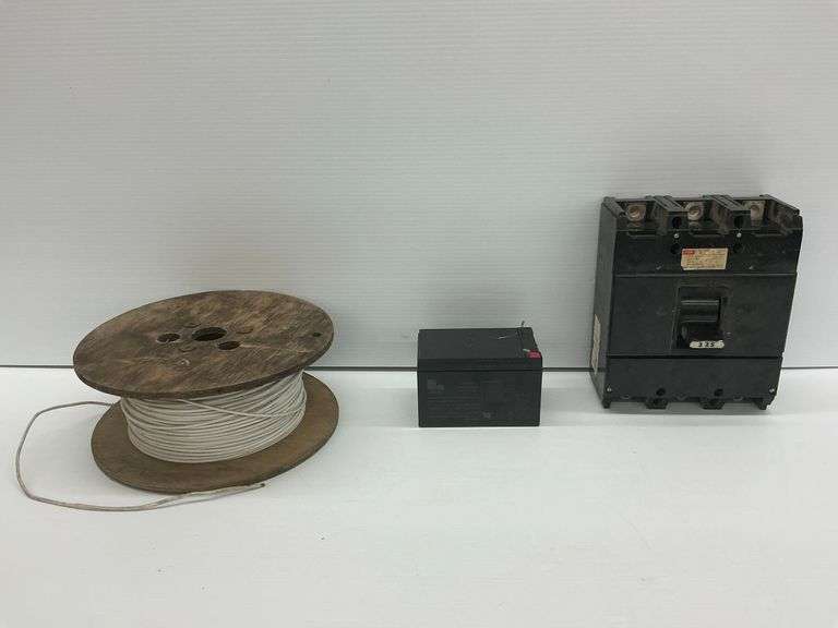 Electrical Parts Lot: FPE Circuit Breaker, Battery, and Wire Spool image