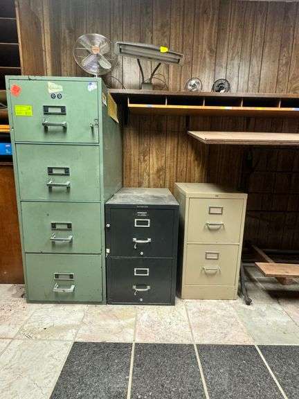 Three Metal File Cabinets image