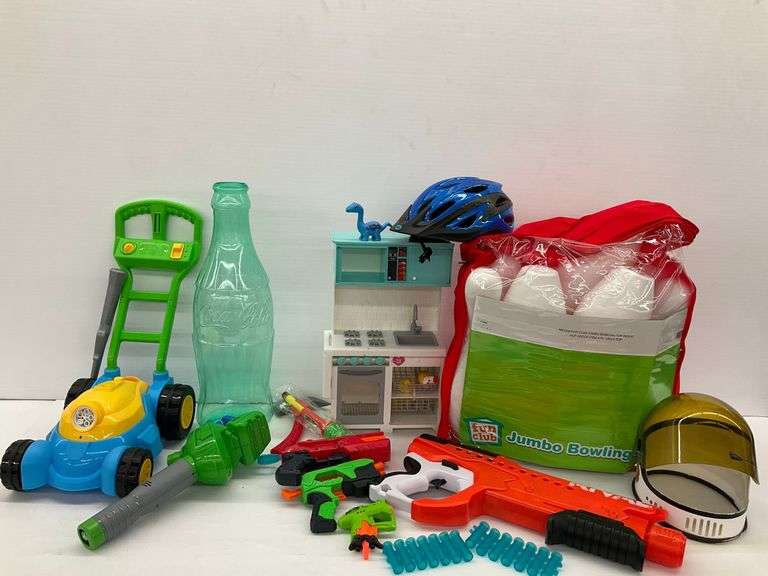 Group of Toys and Games - Nerf Guns, Bowling Set, Lawn Mower, and More image