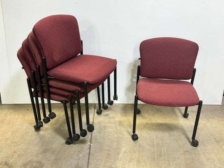 Five Stacking Burgundy Office Chairs with Casters image