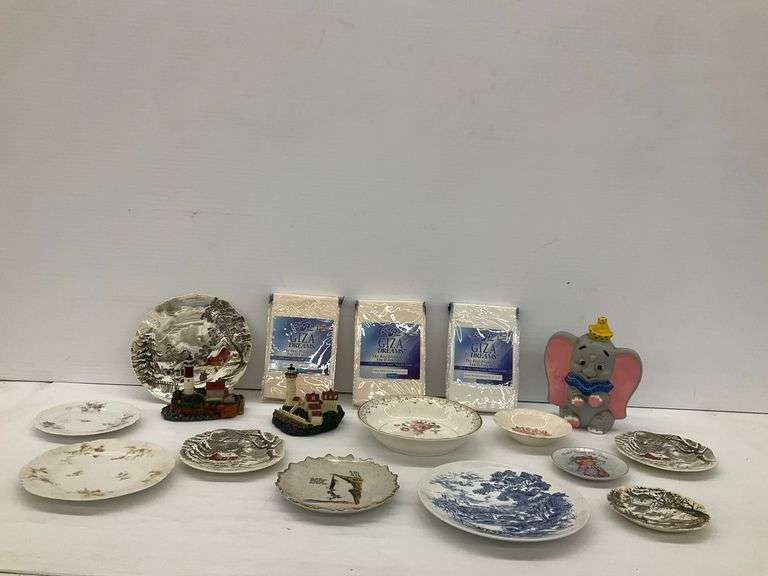 Collectible Plates, Lighthouse Figurines, Pillowcases & Dumbo Figurine Lot image