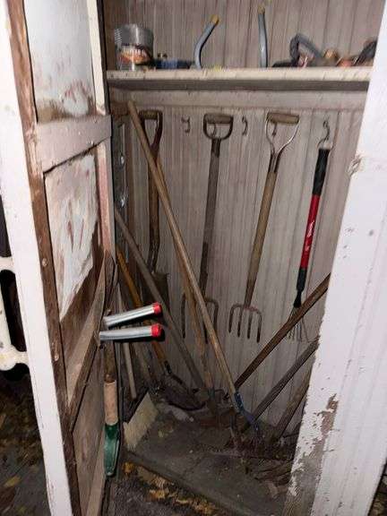 Cabinet with Yard Tools & Lawn Decor image