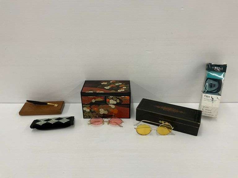 Pen Set, Glasses, Boxes, and Fitness Tracker image
