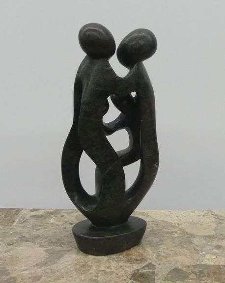 Abstract Sculpture of Two Figures made in Zimbabwe  13 in. tall image