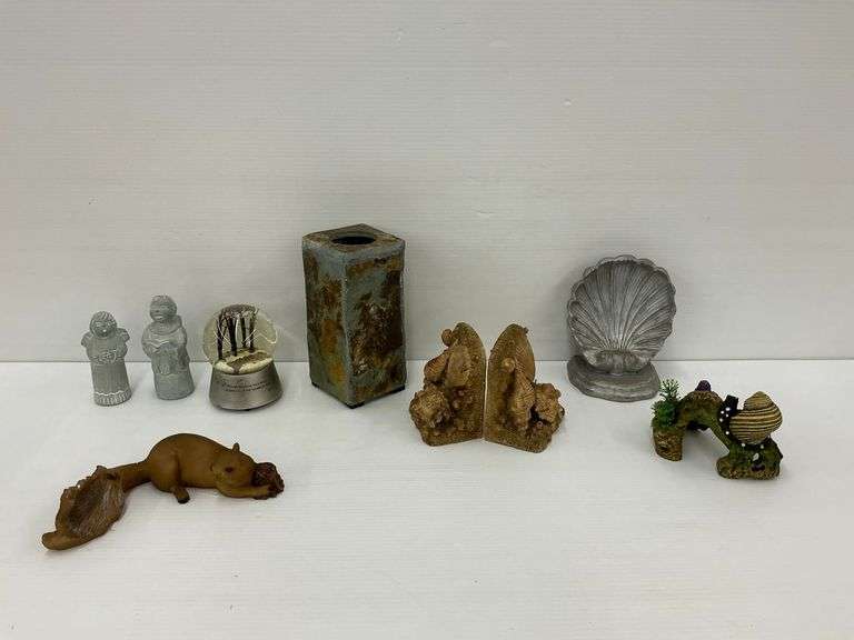 Selection of Decorative Items: Bookends, Figurines, and Snow Globe image