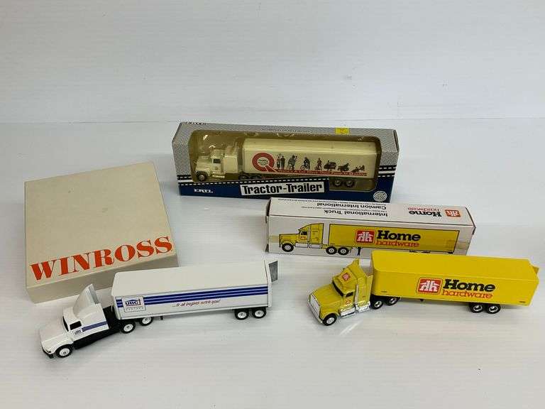 Three Diecast Semi-Trucks with Trailers... Ertl and Winross image