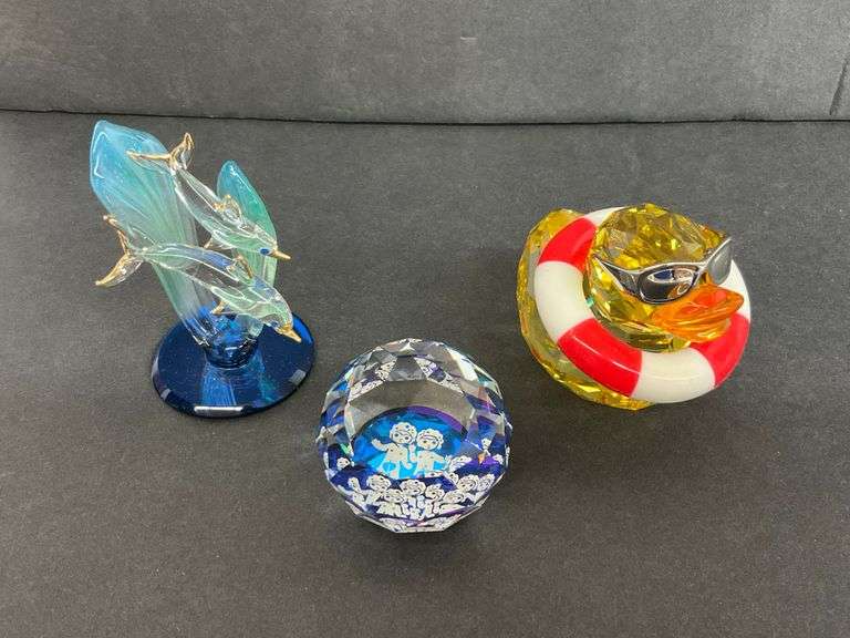 Three Swarovski Crystal Figurines - Dolphin, Duck, and Children Paperweight image