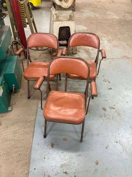 Three Cushioned Orange Folding Chairs ... 30 in. tall. image
