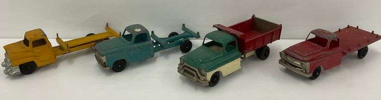 Four Vintage Hubley Kiddie Toy Trucks image
