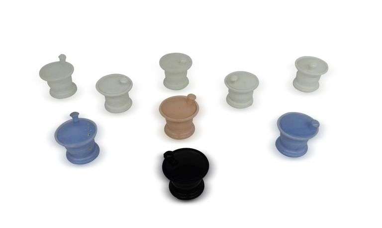 Nine Small Glass Containers Including JV Co. Inc. image