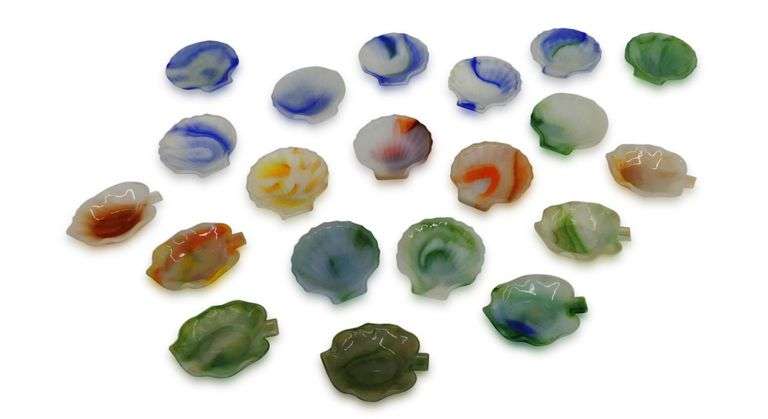 Eighteen Marbled Glass Seashell and Leaf Shaped Dishes image