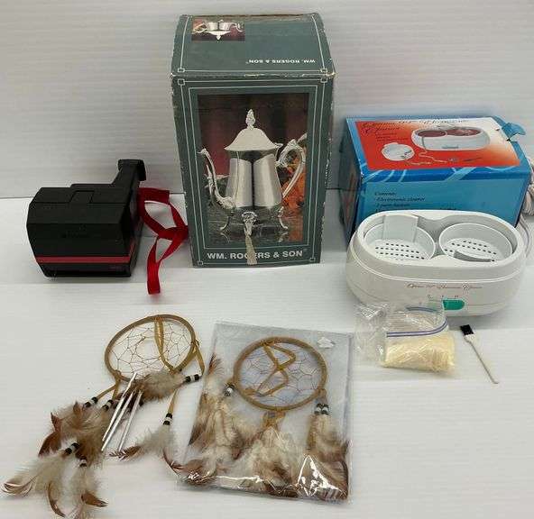 Polaroid Camera, New Wm. Rogers Coffee Pot, Dream Catchers, and Jewelry Cleaner image