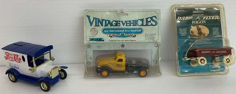 Diecast Vehicle Lot - 1947 International K-12 Semi-Cab, Radio Flyer Wagon, and Pepsi Coin Bank image