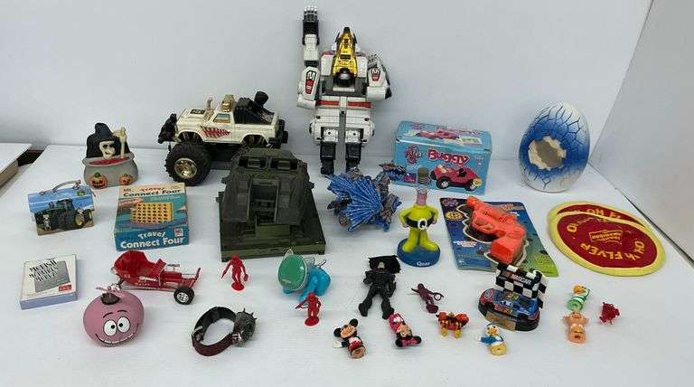 Assortment of Toys and Collectibles, Including Power Ranger, Toy Vehicles, Disney Figures, and Others image
