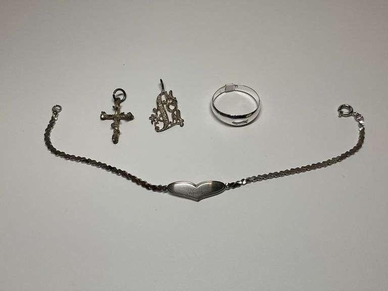 Sterling Silver Jewelry Assortment - Pendants, Ring, and 'Laura' Bracelet image