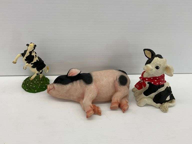 Cow and Pig Figurines image