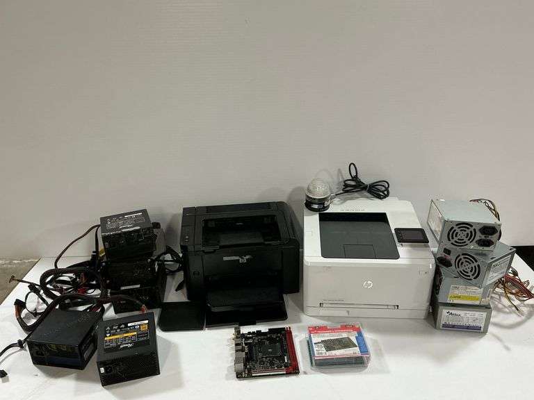 Mixed Electronics Lot: HP LaserJet Printers, Power Supplies, Motherboard, & More image