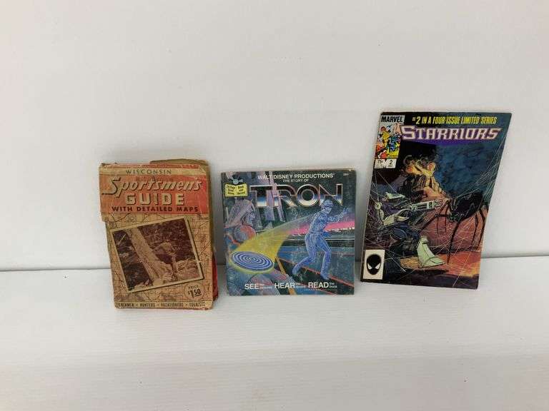 Tron Read-Along Book, Sportsmen's Guide, and Starriors Comic Book Bundle image
