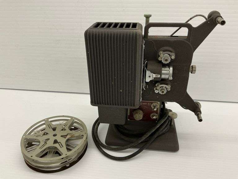 Vintage Kodascope Eight-33 Film Projector with Film Reel, powers on image
