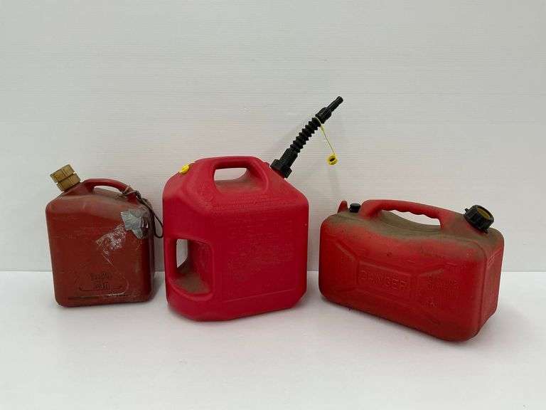 Three Red Gasoline Cans image