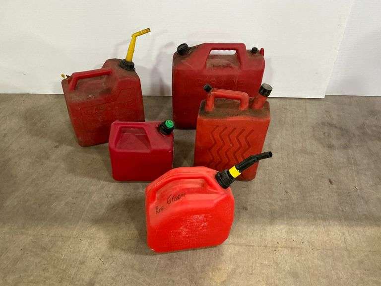 Group of 5 Plastic Gasoline and Diesel Fuel Cans image