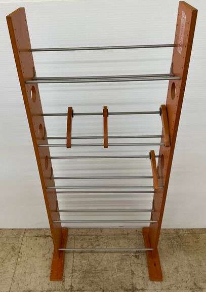 Freestanding Media Storage Rack with Adjustable Bars image