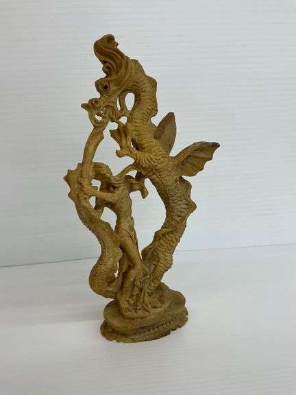 Resin Sculpture of Asian Man and Dragon image