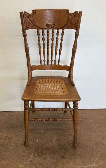 Vintage Ornate Wooden Chair with Woven Cane Seat image