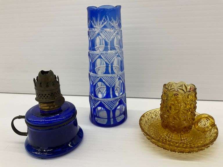 Three Glass Pieces - Cobalt Blue Oil Lamp, Blue Cut-to-Clear Vase, and Amber Candle Holder image