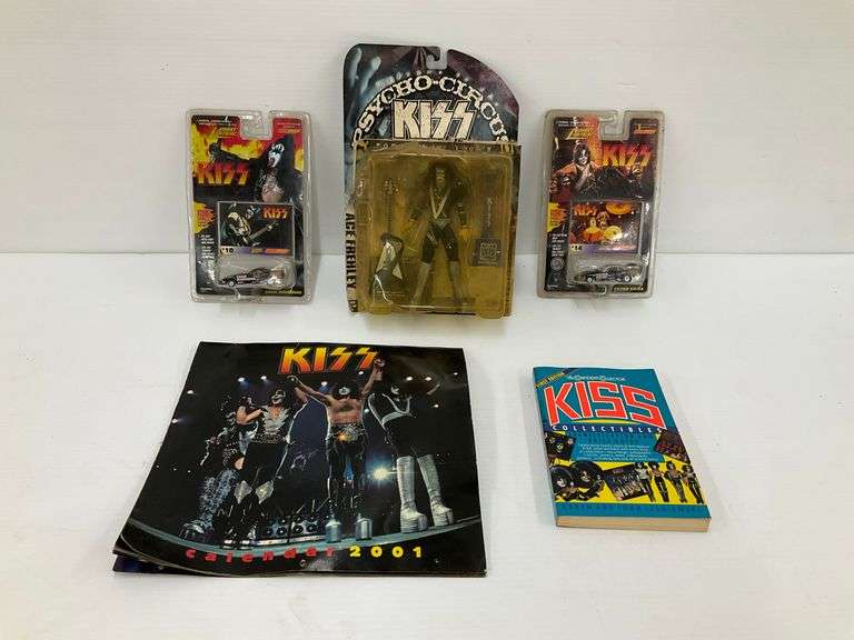 Kiss Memorabilia Lot: Action Figure, Diecast Cars, Calendar, and Collectibles Book image