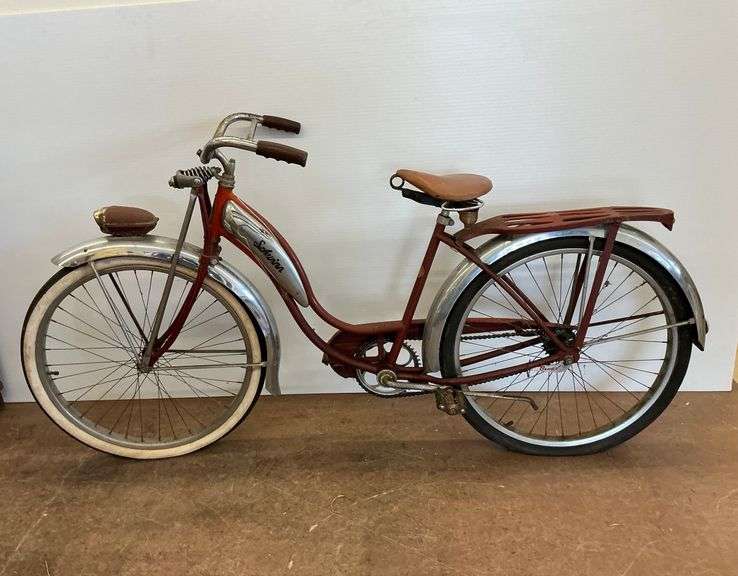 Vintage Schwinn Ladies' Red Bicycle with Delta Rocket Ray Headlight image