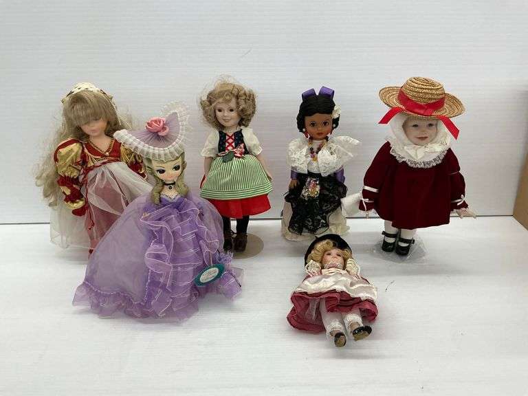 Various Porcelain Dolls in Costume image
