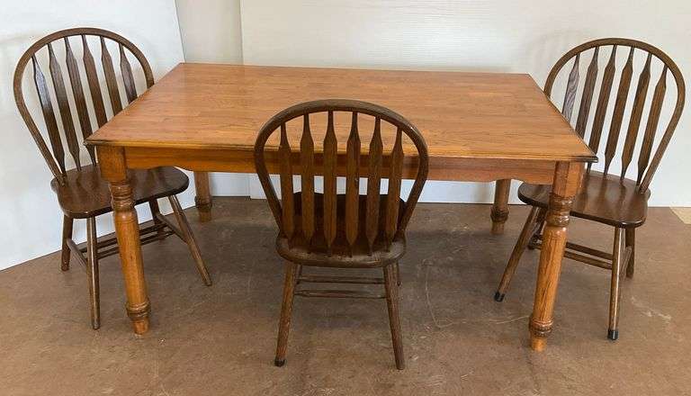 Wooden Dining Table with Three Spindle Back Chairs...see photos for condition image