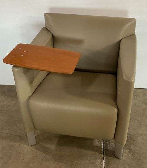 Modern Tan Color Chair with Attached Writing Surface image