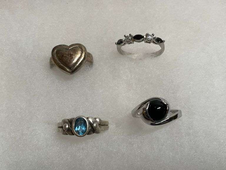Four Sterling Silver Rings ... see description and photos image
