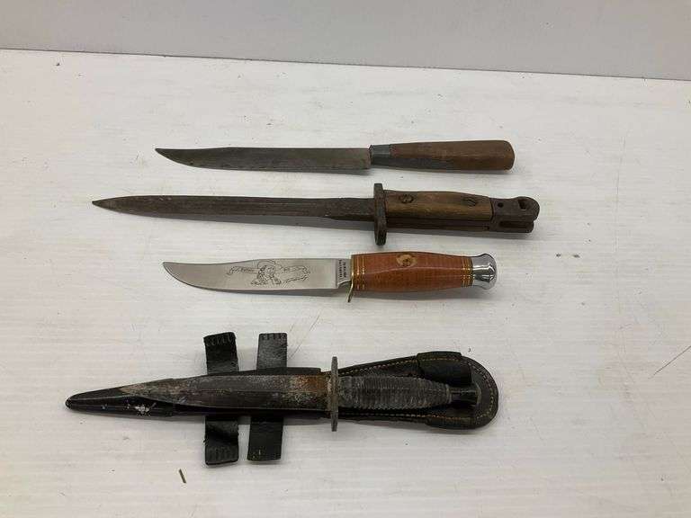 Four Knives Including a Buffalo Bill Knife and a 1907 Wilkinson Bayonet image