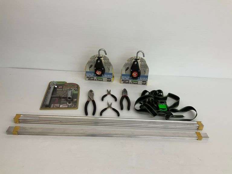 Metal Rails, Rope Ratchets, Gator Grip Wrench, Pliers, and Strap image