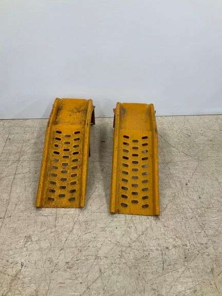 Pair of Yellow Metal Car Ramps image