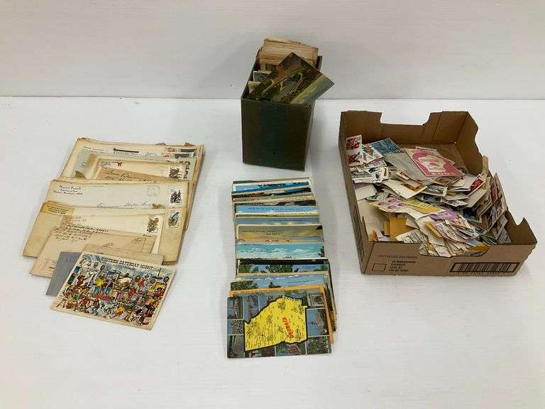 Large Assortment of Postage Stamps, Postcards, and Envelopes image