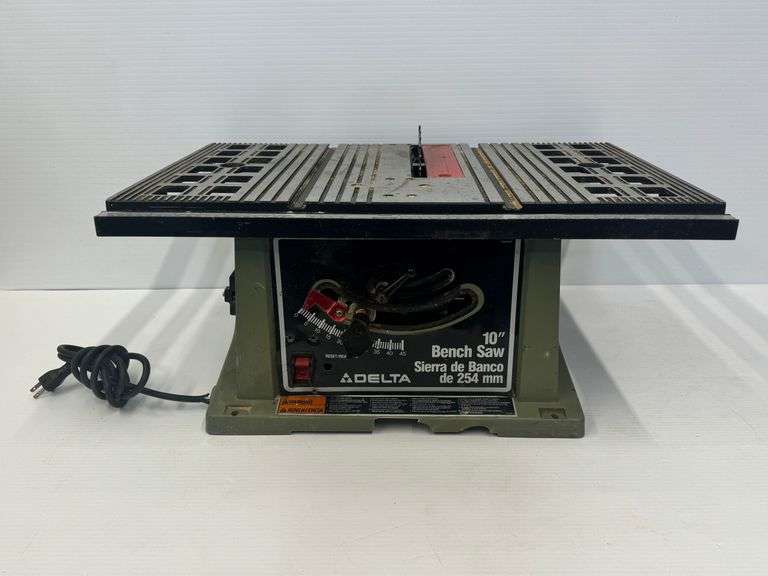Delta 10 in. Bench Saw - Model 36-540... powers on image