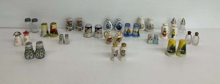 Numerous Salt and Pepper Shakers image