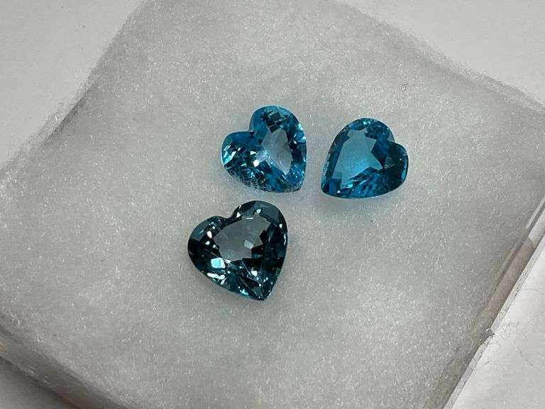 Three Faceted Heart-Shaped Gemstones image