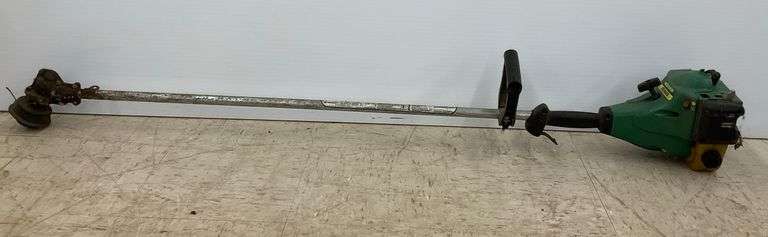 Weed Eater XT600 String Trimmer...has compression image