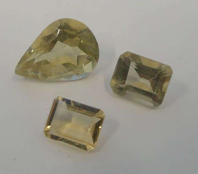 Three Faceted Citrine Gemstones....12.00 carats image
