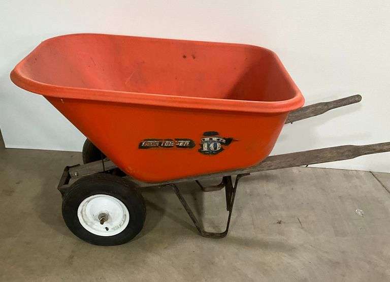 Orange True Temper Wheelbarrow image