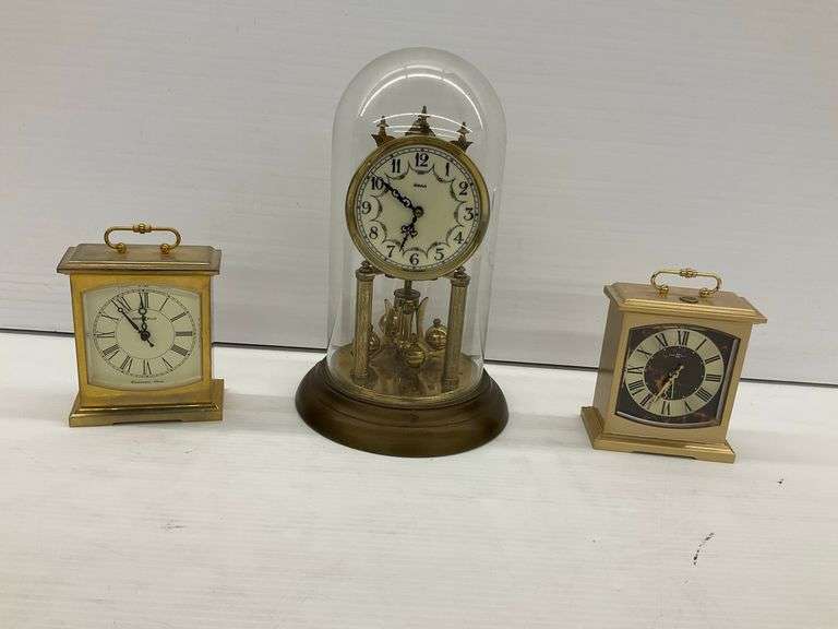 Haco Anniversary Clock with Dome & Two Howard Miller Carriage Clocks image
