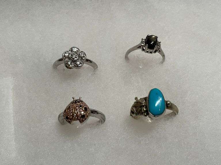 Four Sterling Silver Rings - Flower, Ladybug, Turquoise and Oval Stone image
