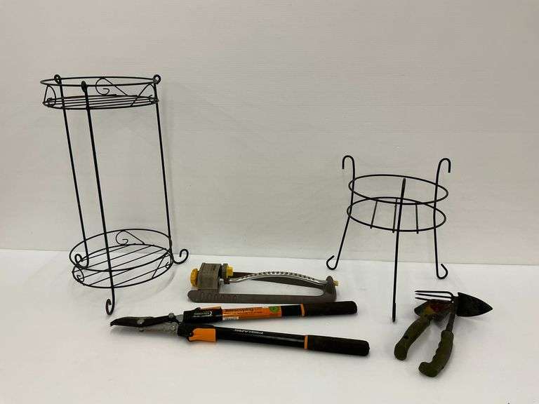 Gardening Tools and Two Iron Plant Stands image